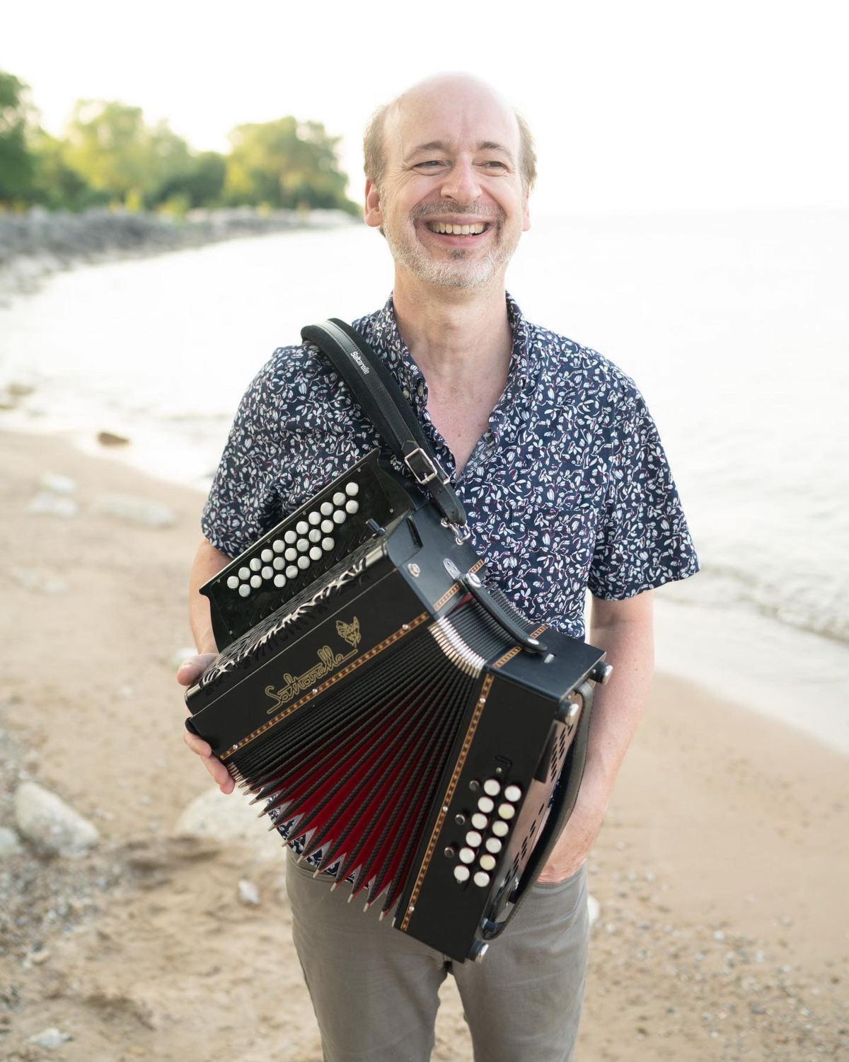 Photo of John Williams with accordion