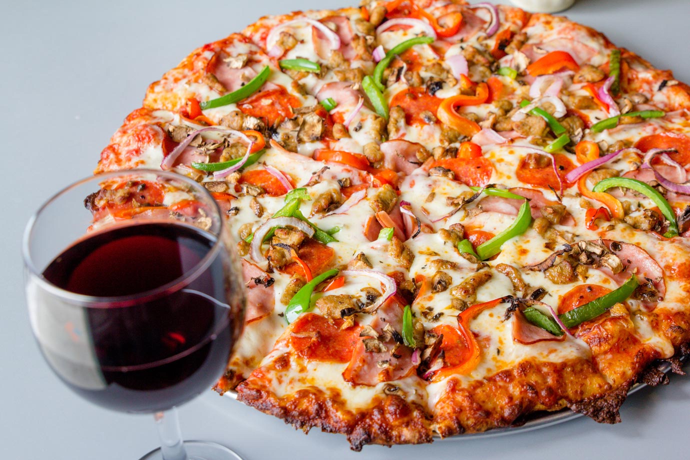 pizza and glass of wine