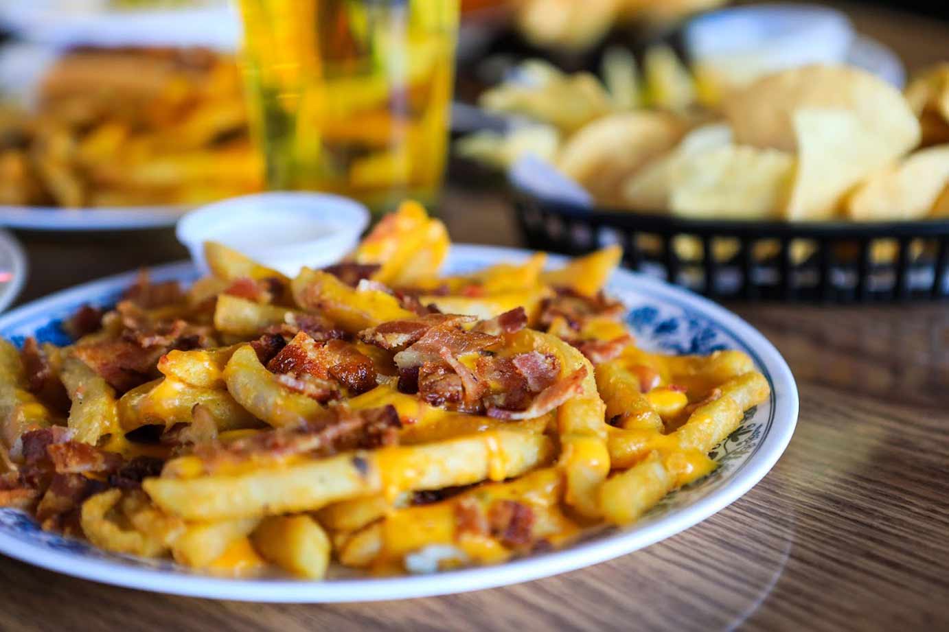 French fries with bacon and cheese