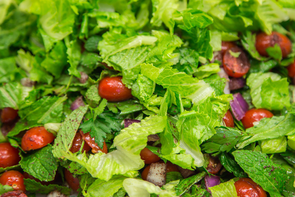 Green salad with cherry tomatoes, extreme closeup