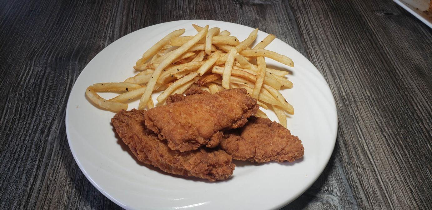 Fried chicken with fries on side
