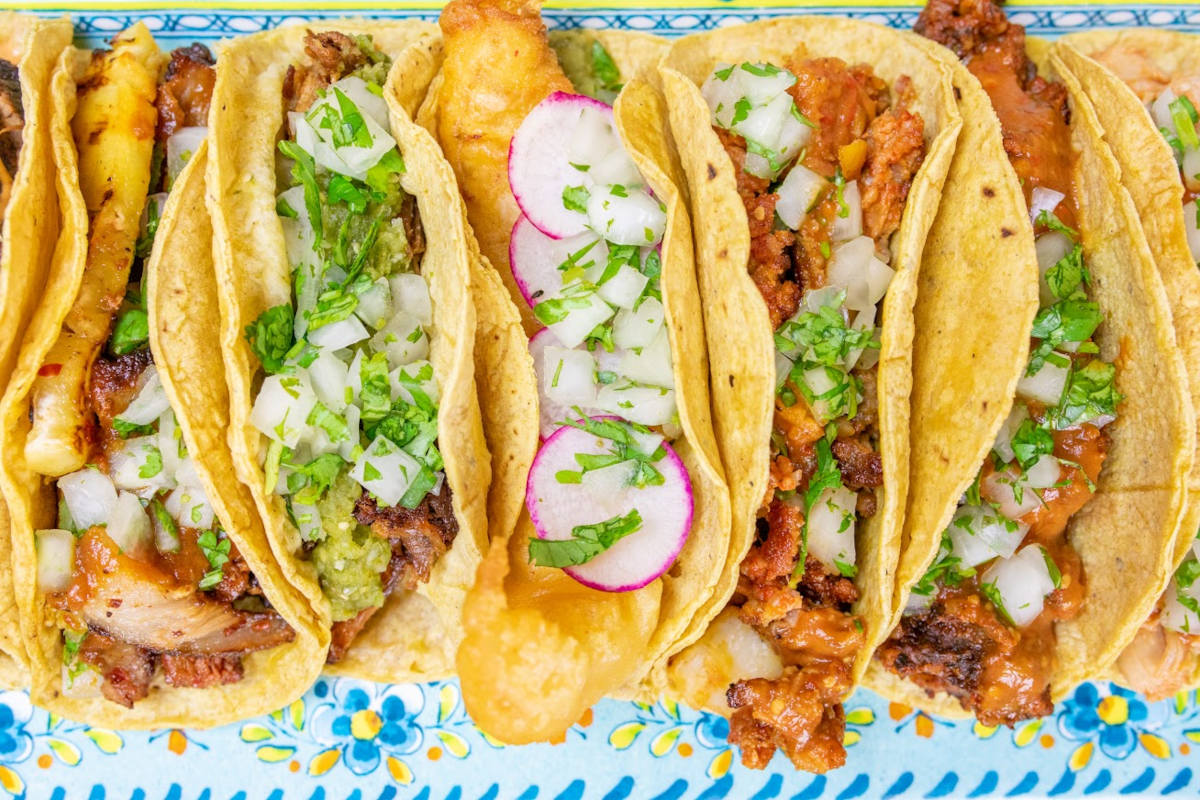 Various tacos served