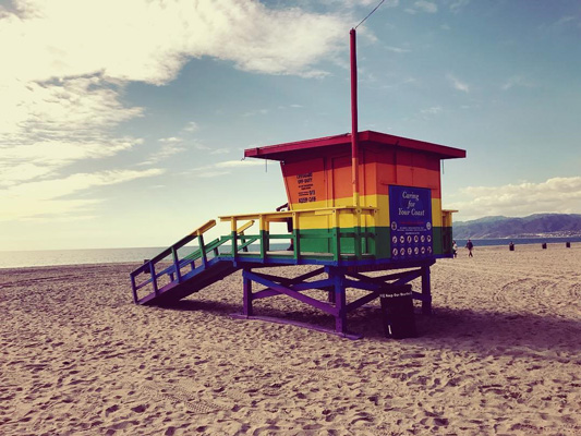 the lifeguard beach house in rainbow colors