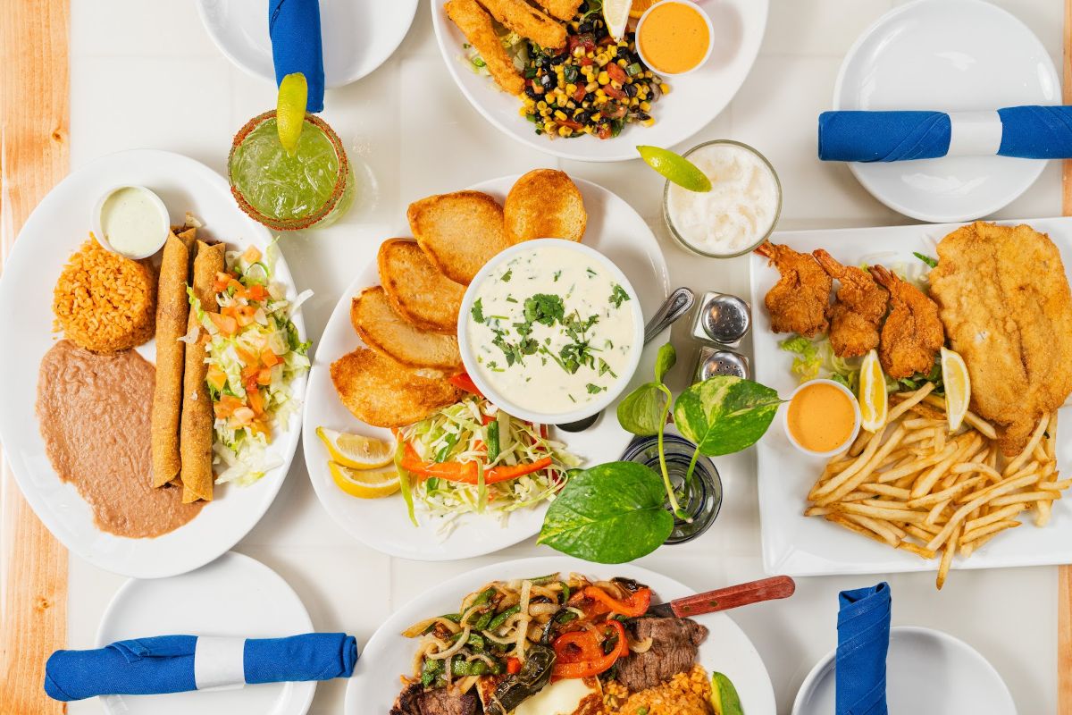 a table with plates of food
    