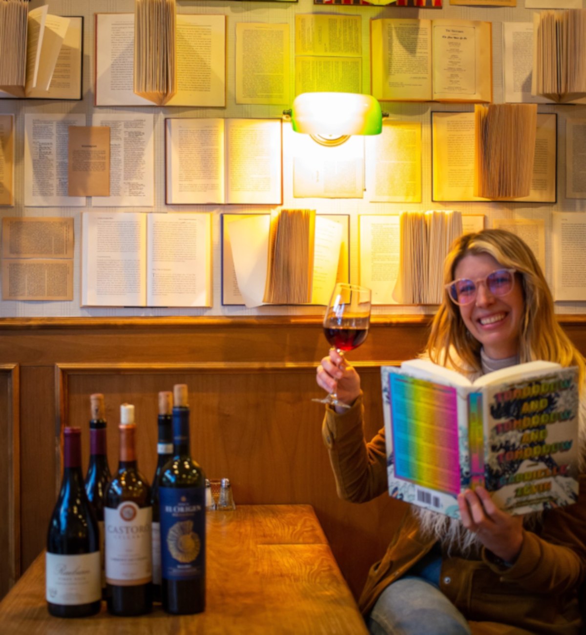 Woman with book and wine
