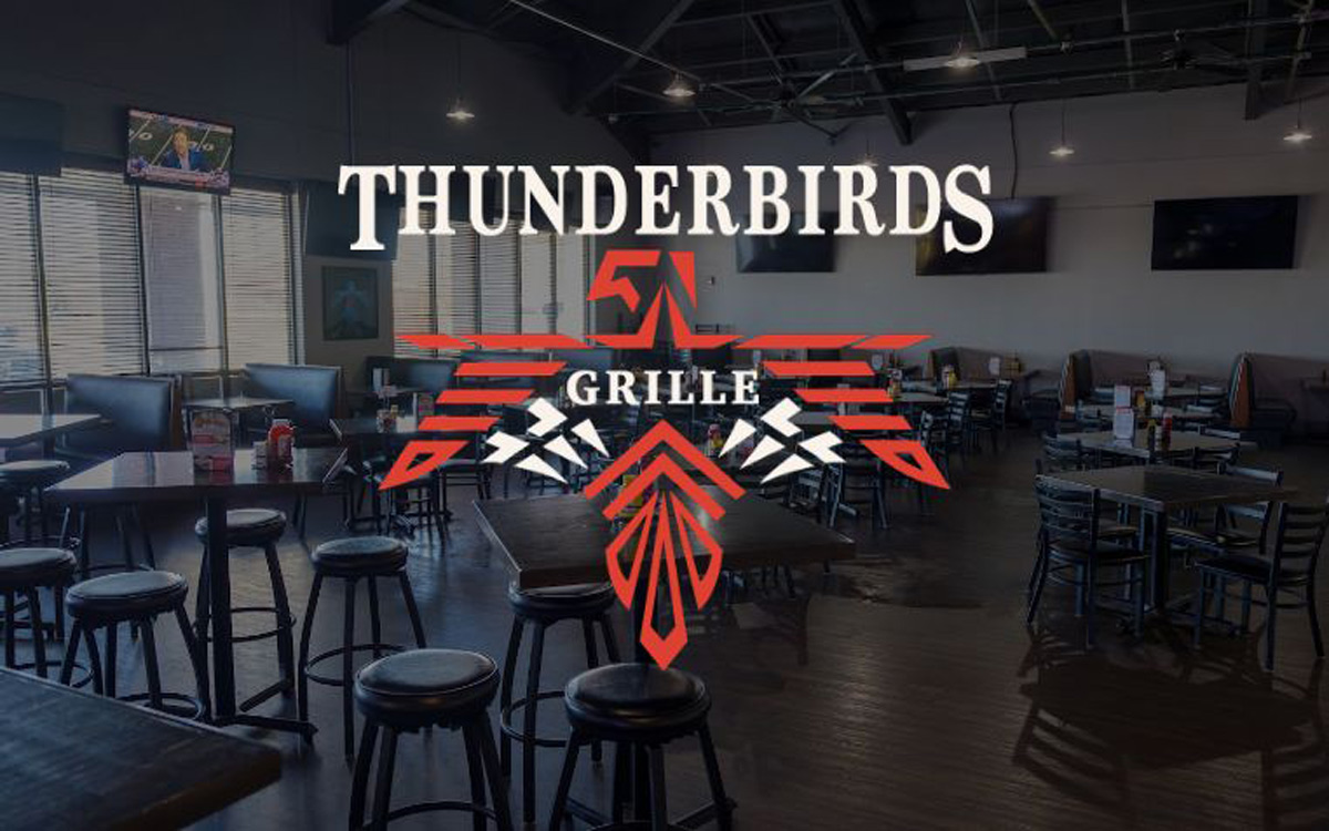 The Thunderbirds interior and logo over the photo