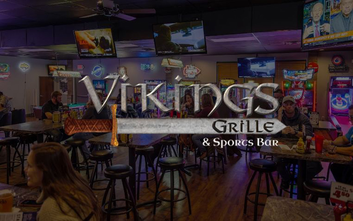 he Vikings interior and logo over the photo