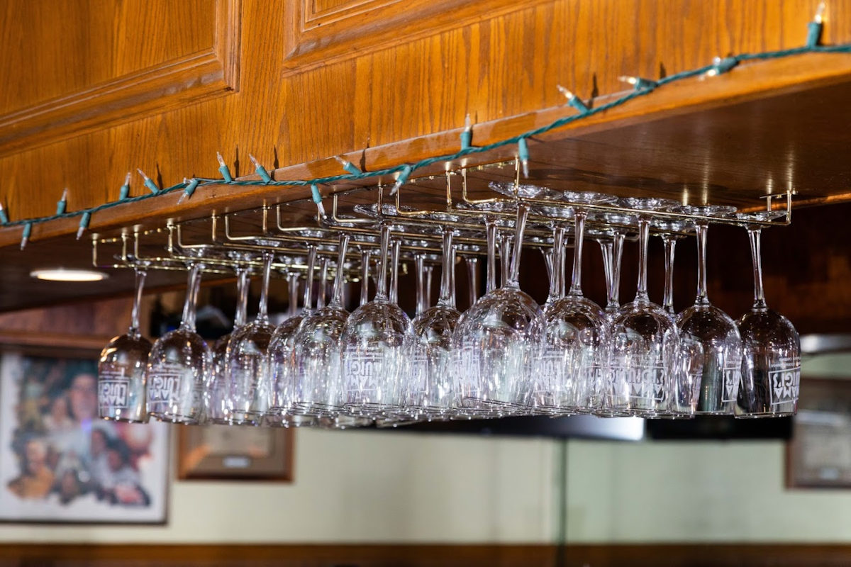  Hanging wine glass rack above the bar