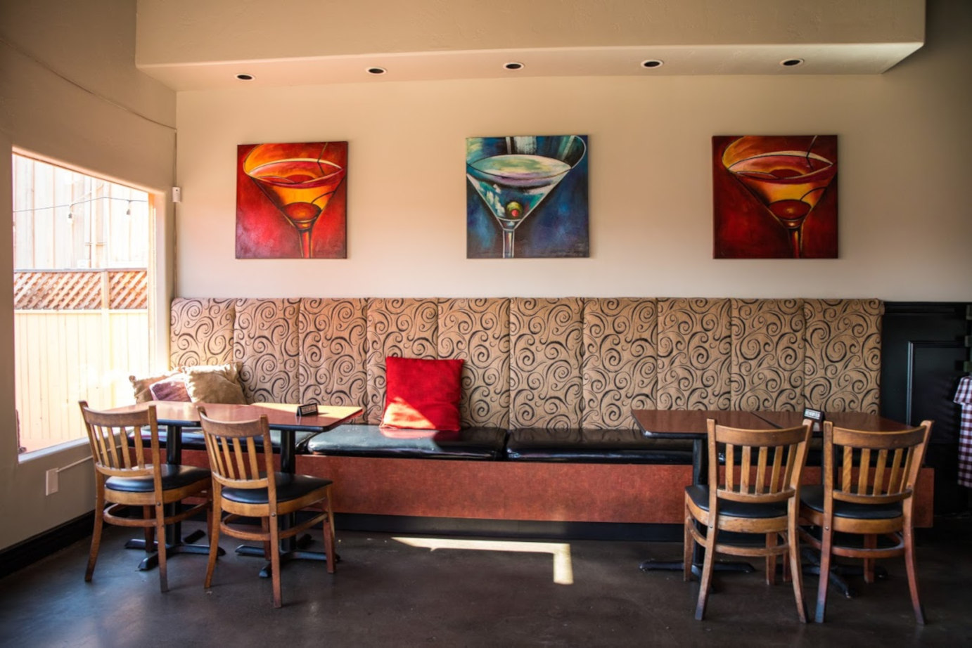 Interior, sitting area, martini images on the wall