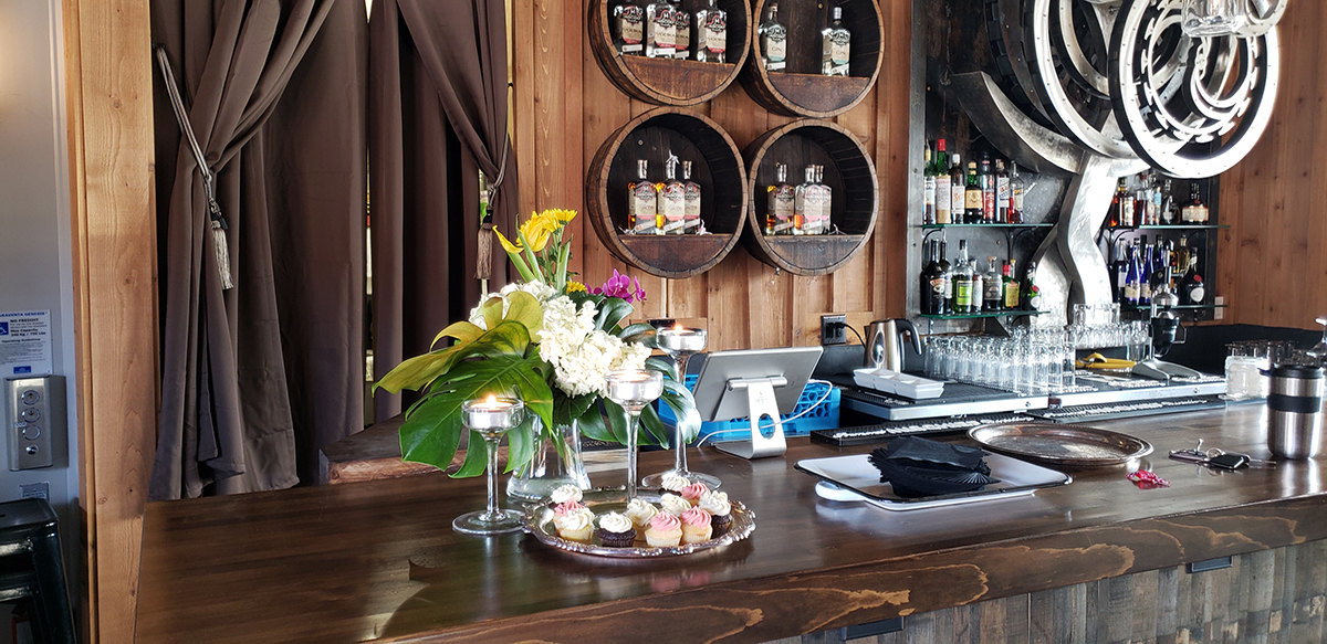 Bar with drinks and flowers