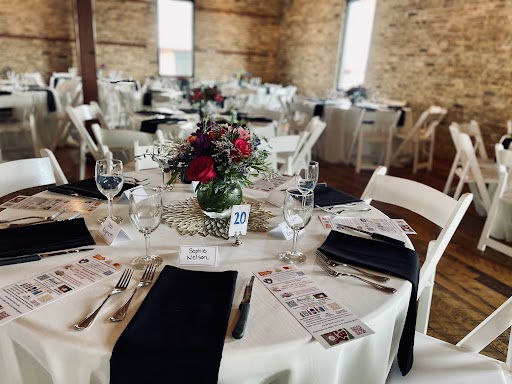 Floral centerpiece on reception table at wedding venue