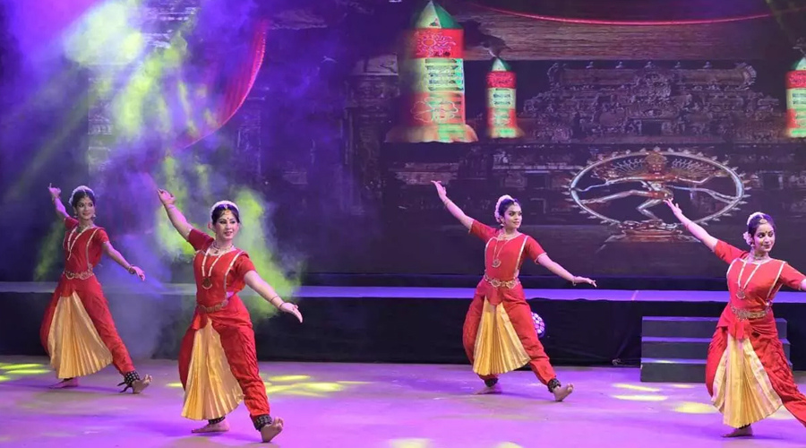 A group of women dancing on stage
