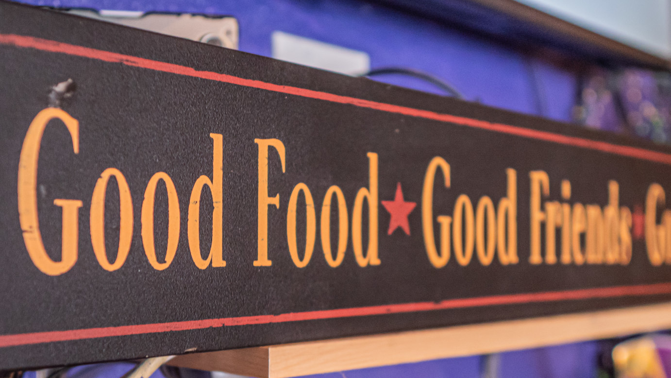 Good Food, Good Friends sign on the wall