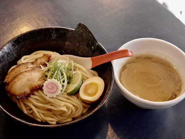 Tsukemen with thick noodles, chashu pork, egg, and dipping broth.