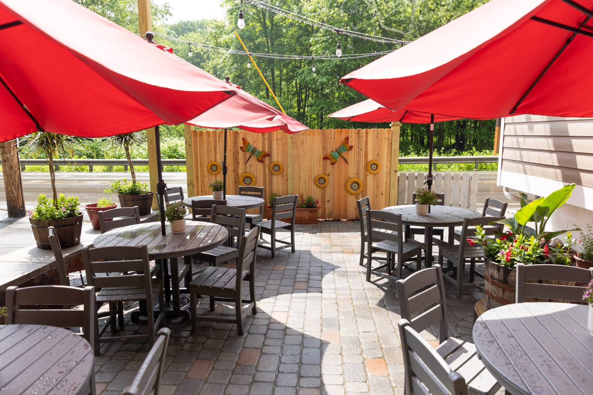 Patio, tables, chairs and parasols