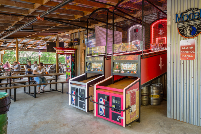 Exterior, covered seating area, arcade game machines
