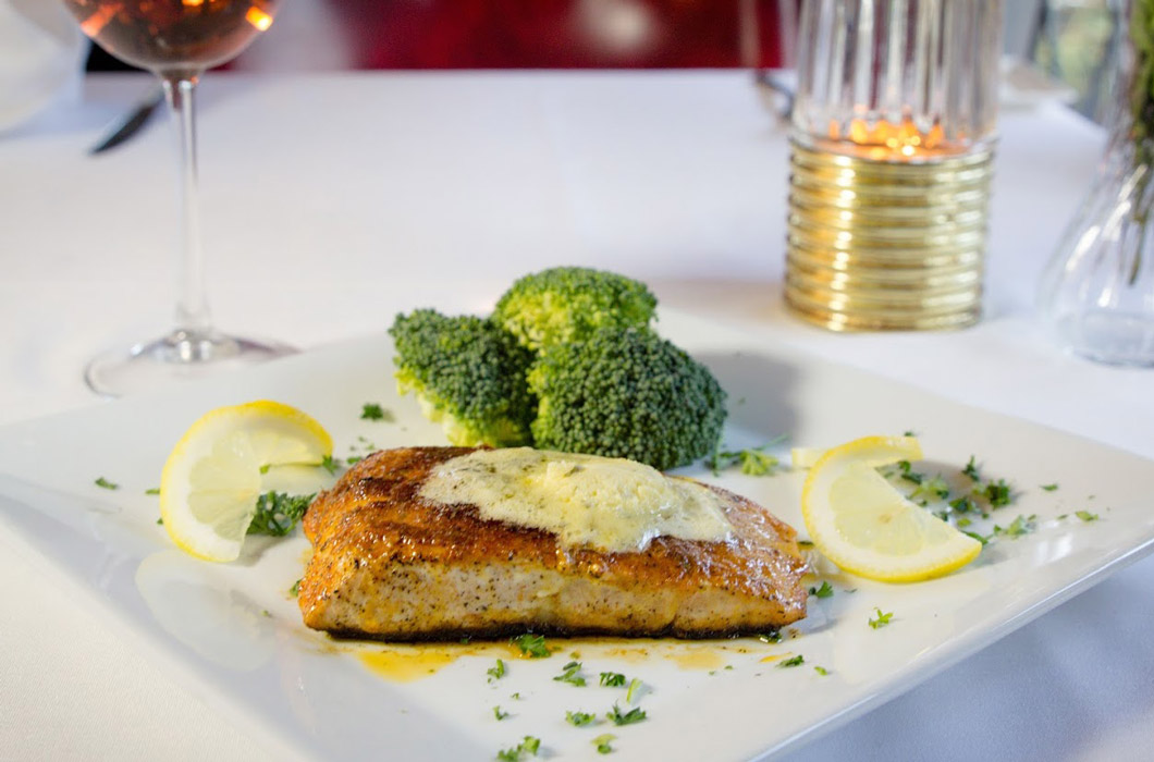 Salmon with broccoli and lime on the side