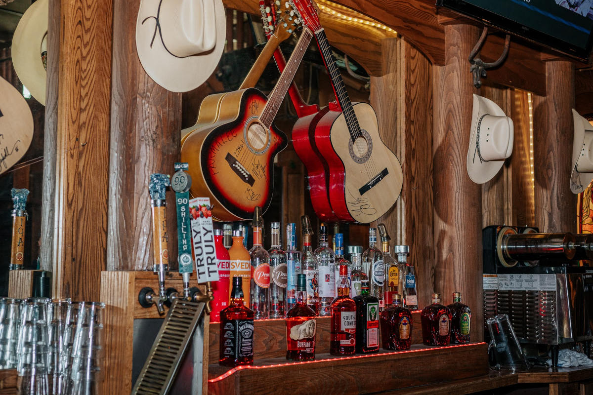 Guitars on the wall and drinks