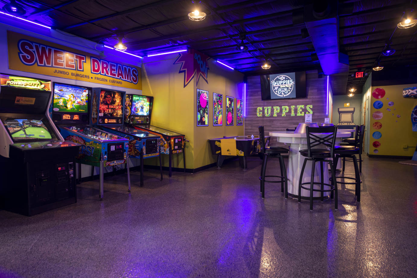 Interior, arcade games, table soccer, and seating
