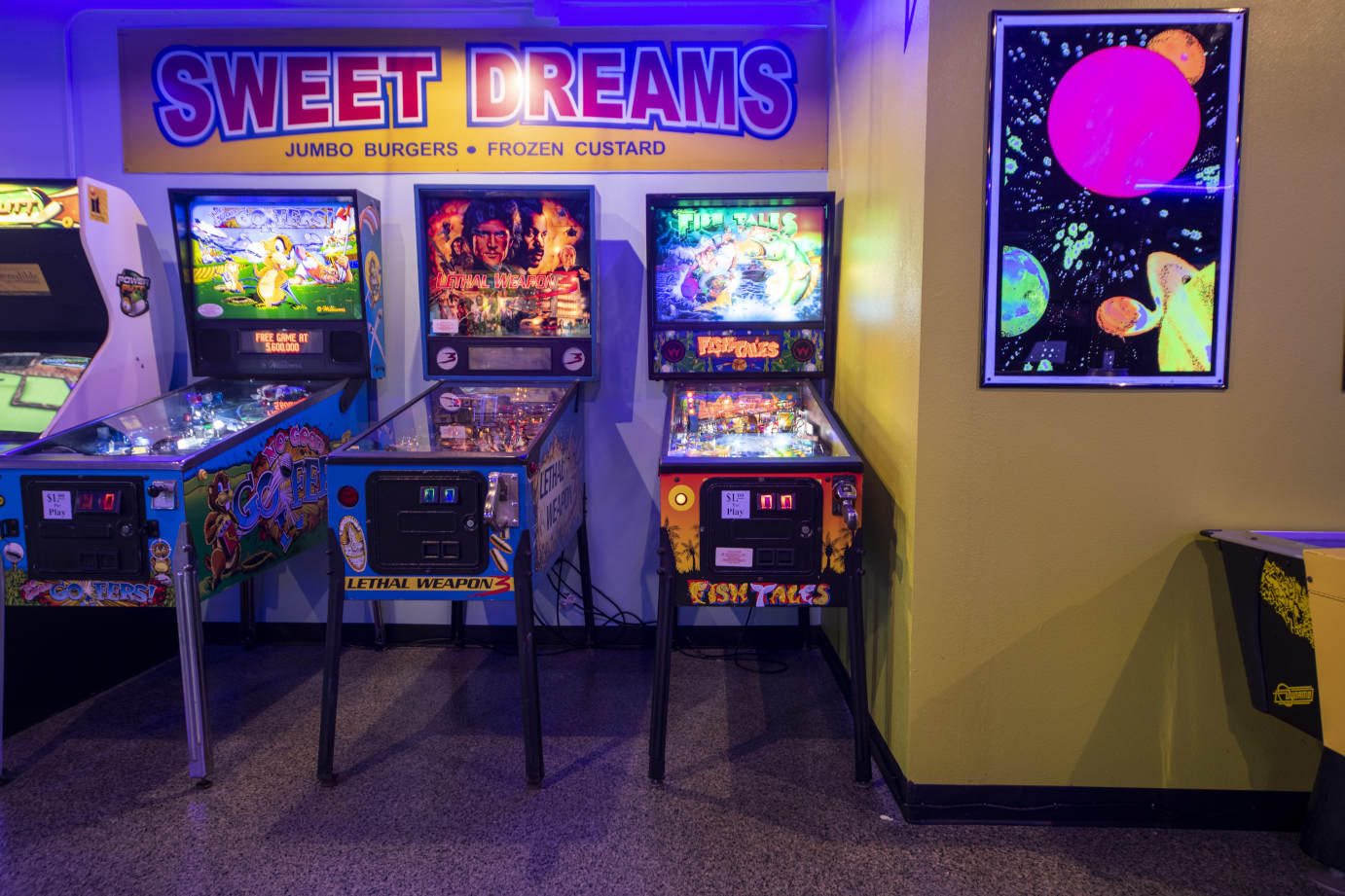 Interior, gaming area, pinball machines