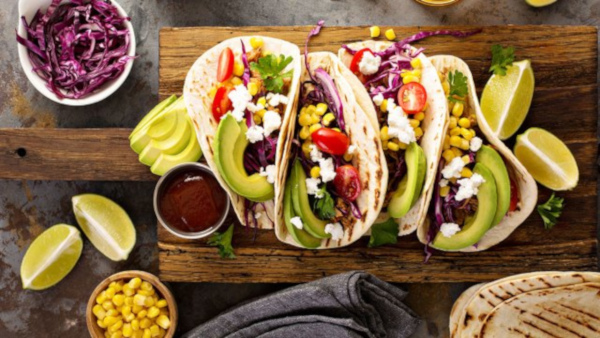 veggie tacos on a wooden board