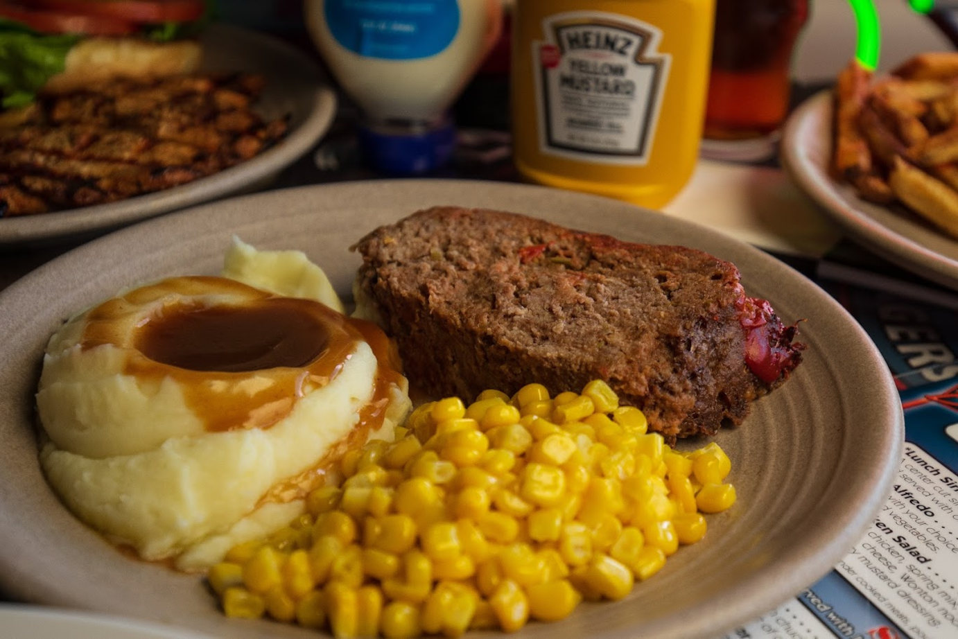 Meatloaf with mashed potatoes and sweet corn