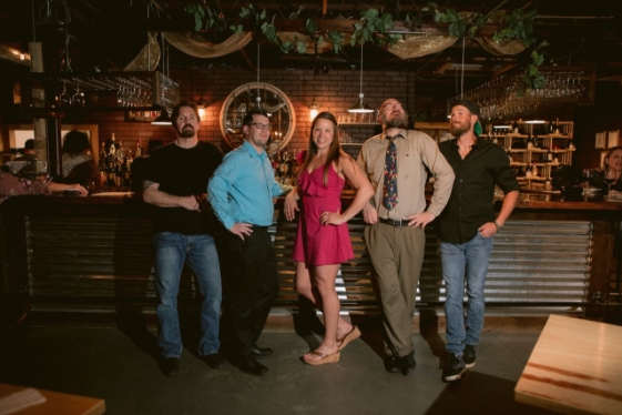 Jesse Cornett & The Revolvers band members posing for a photo