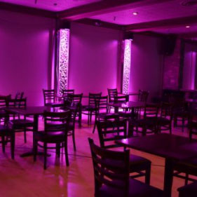 The officer's club room with purple lights