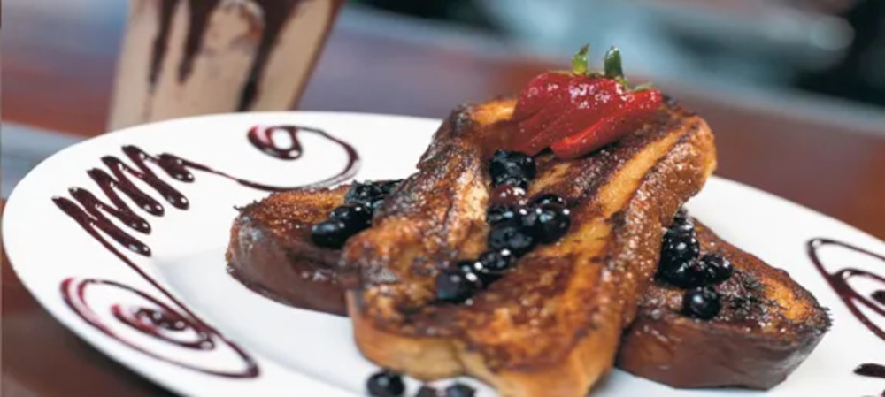 French toast with topping and berries