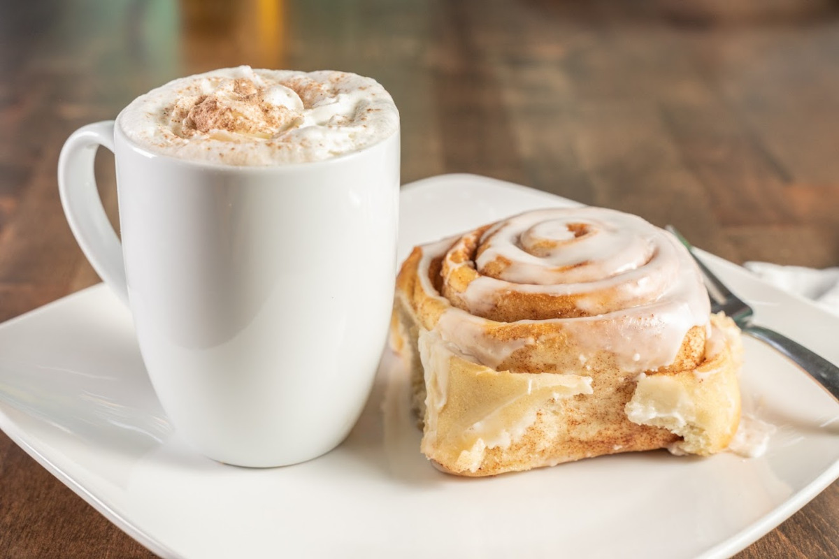 cinnamon roll and cappucino