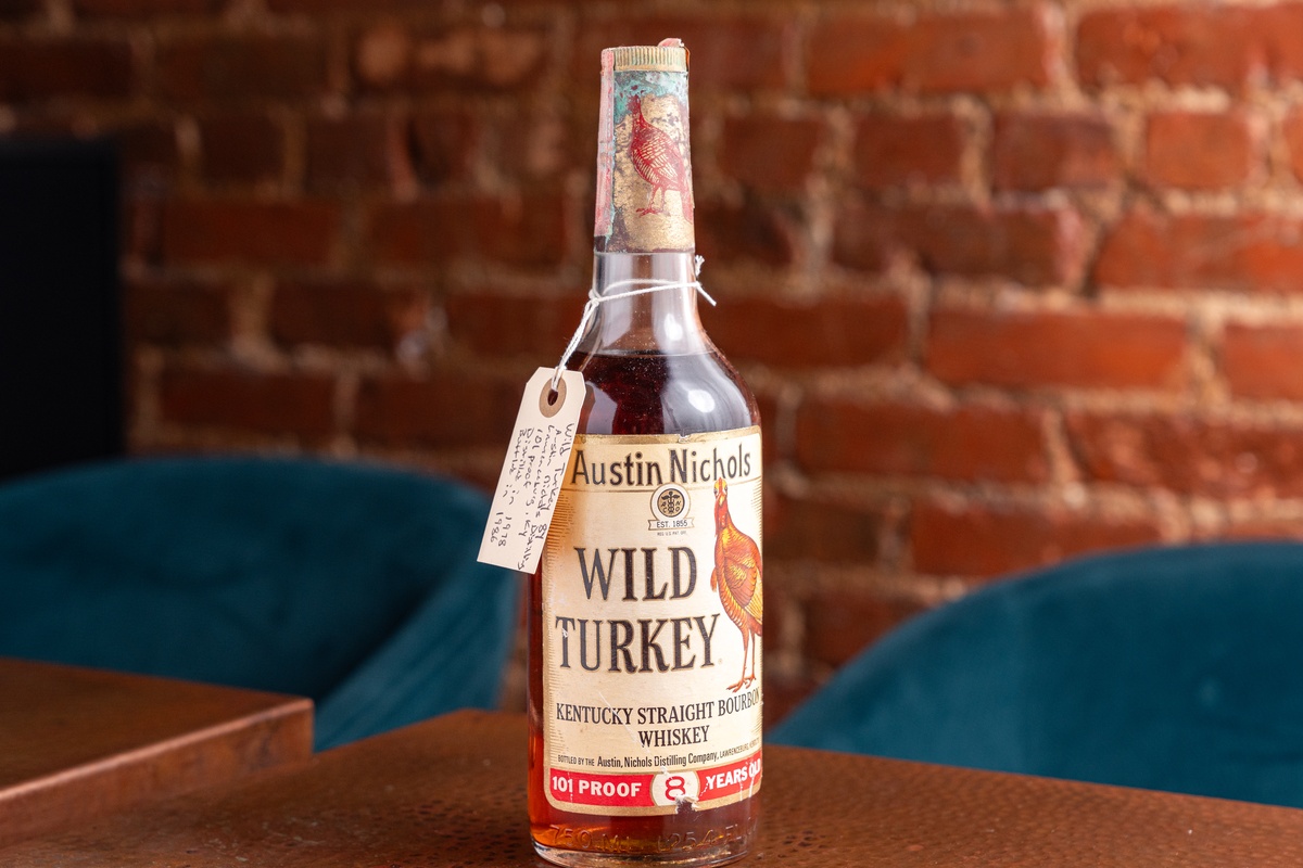 bottle of 1986 Wild Turkey on a table