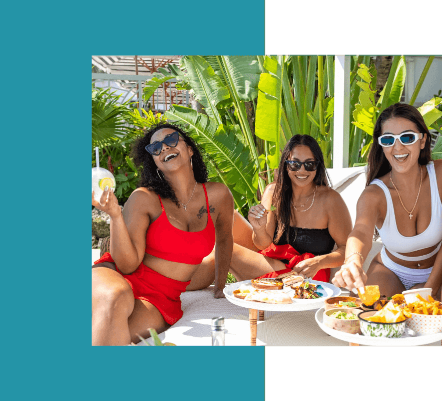 Three girls on the pool sunbad