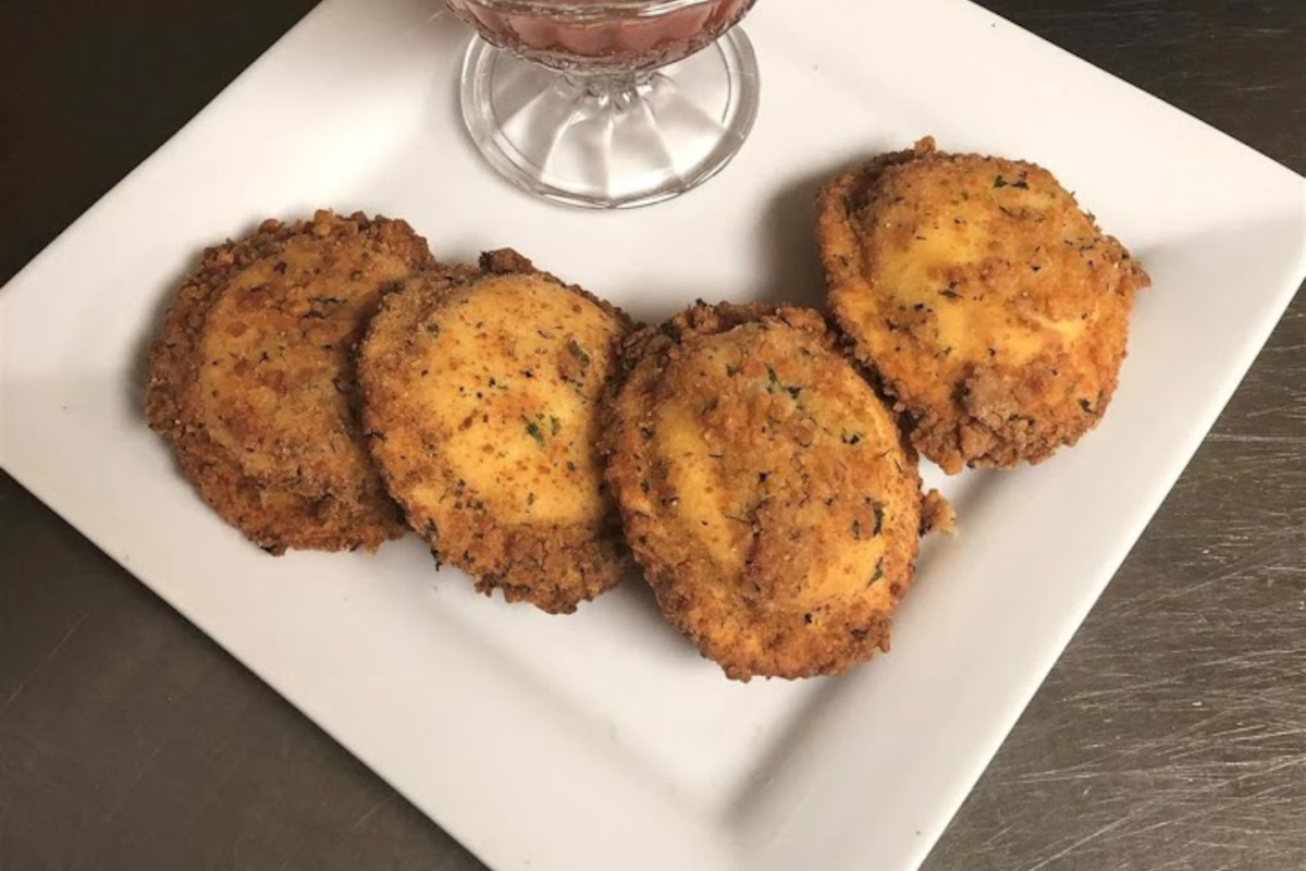 Fried Green Tomatoes served with a tomato sauce