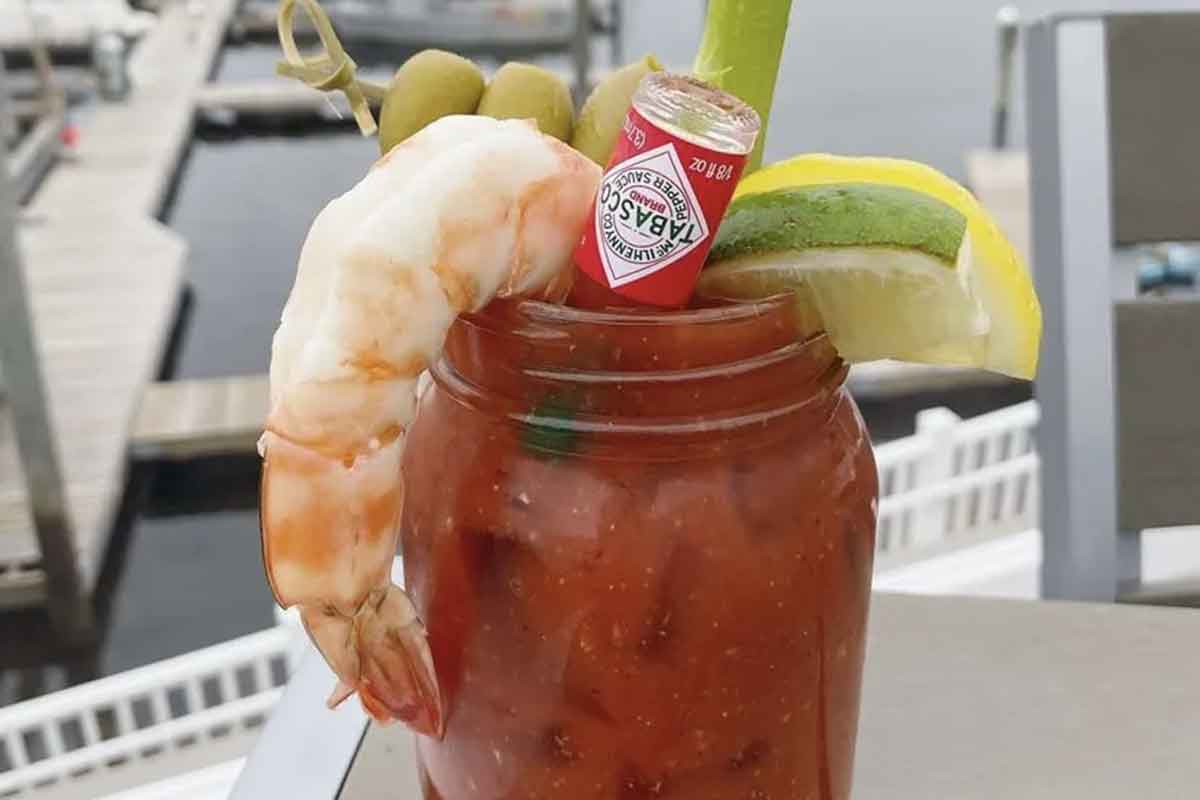 Bloody Mary, with olives, shrimp, lime, and lemon