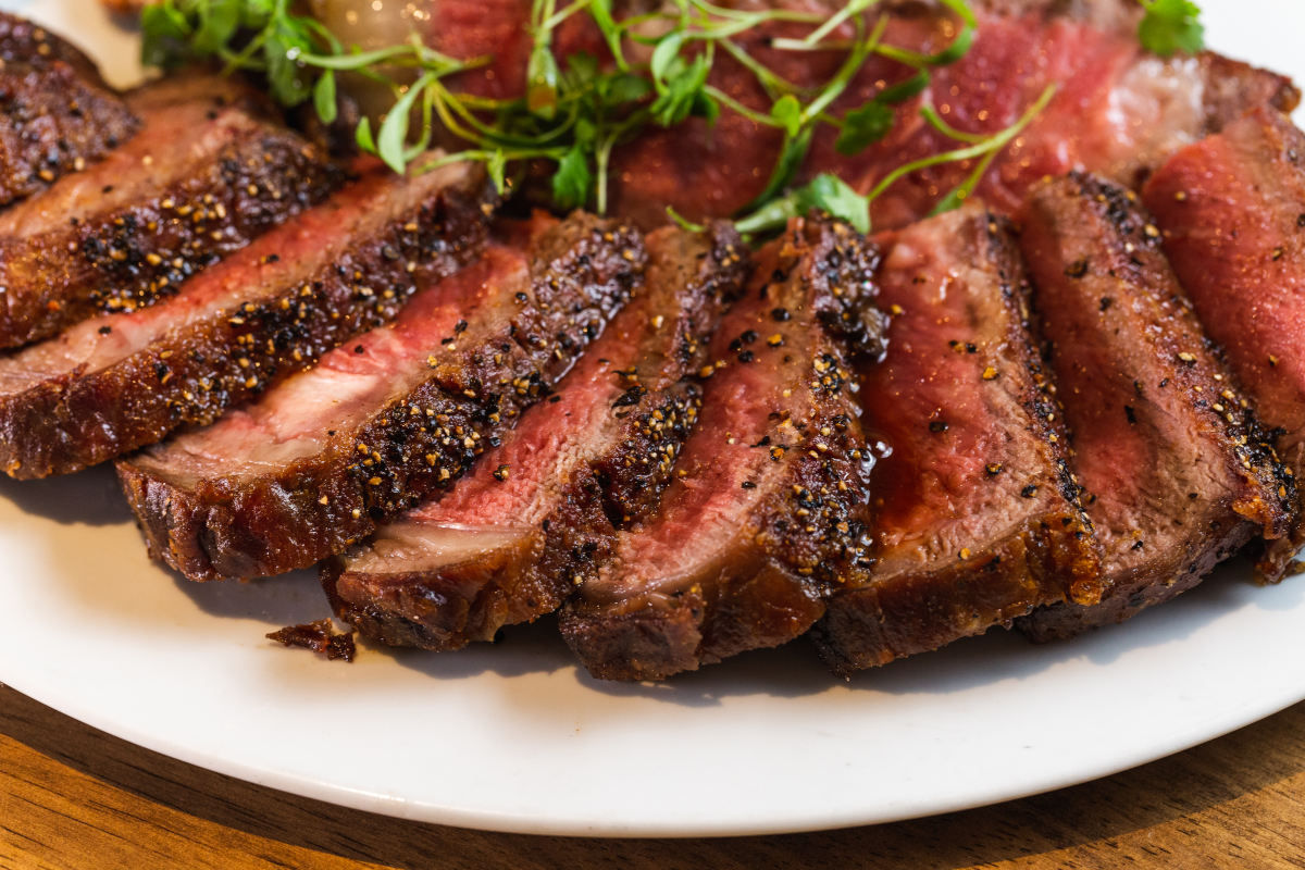 Steaks on a plate.