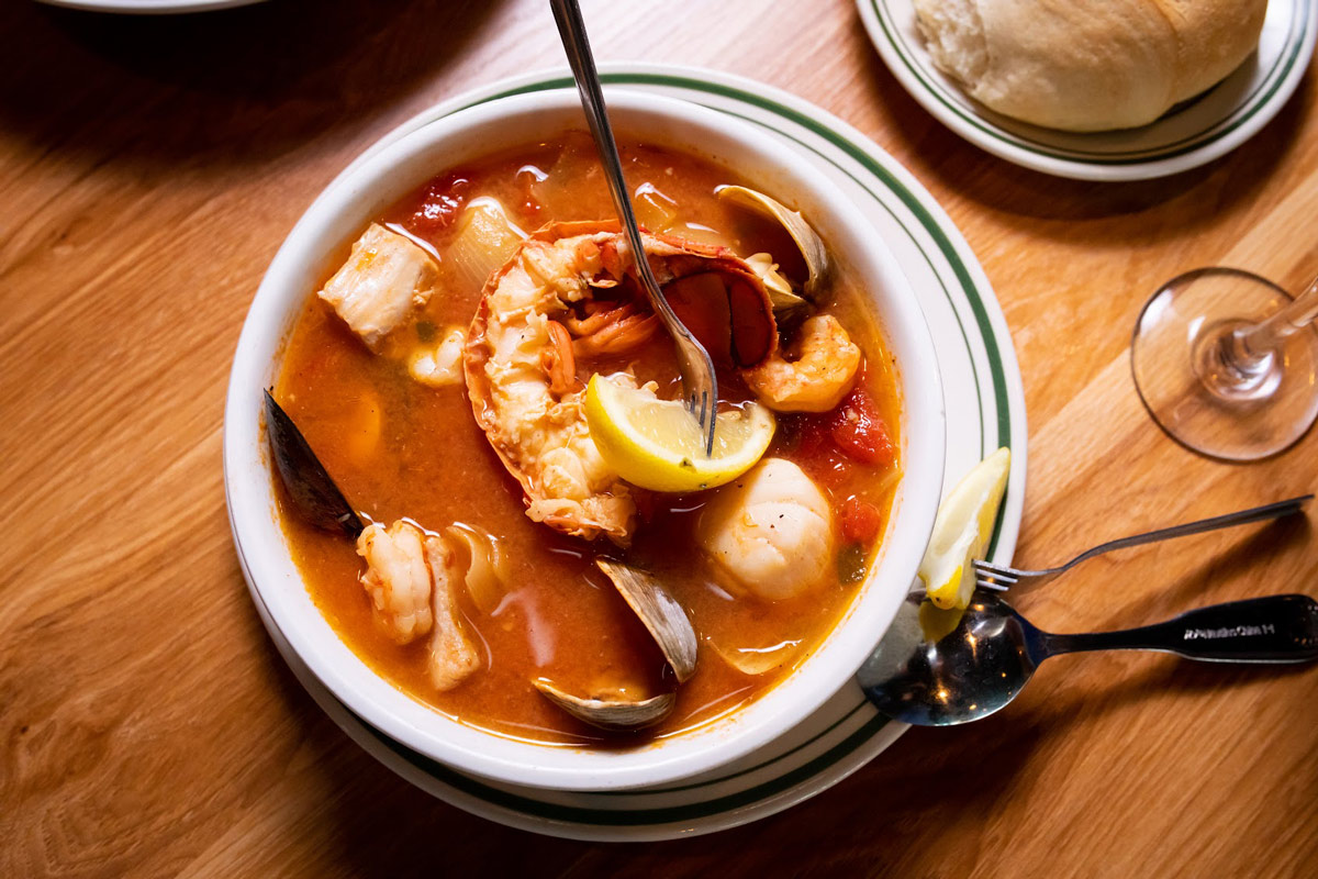 Bouillabaisse soup made with various kinds of fish