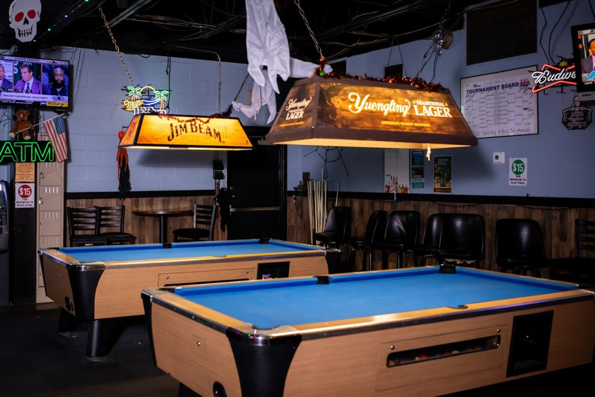 Angled view of the interior with the pool tables.