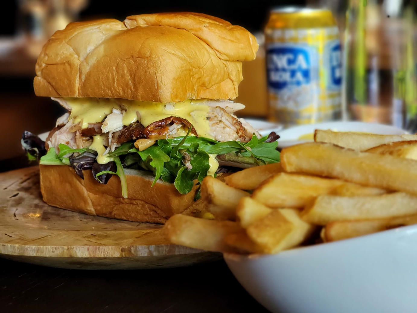 Chicken, cheese and arugula sandwich and fries