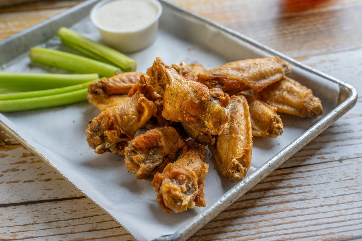 Wings, celery and a sauce dip