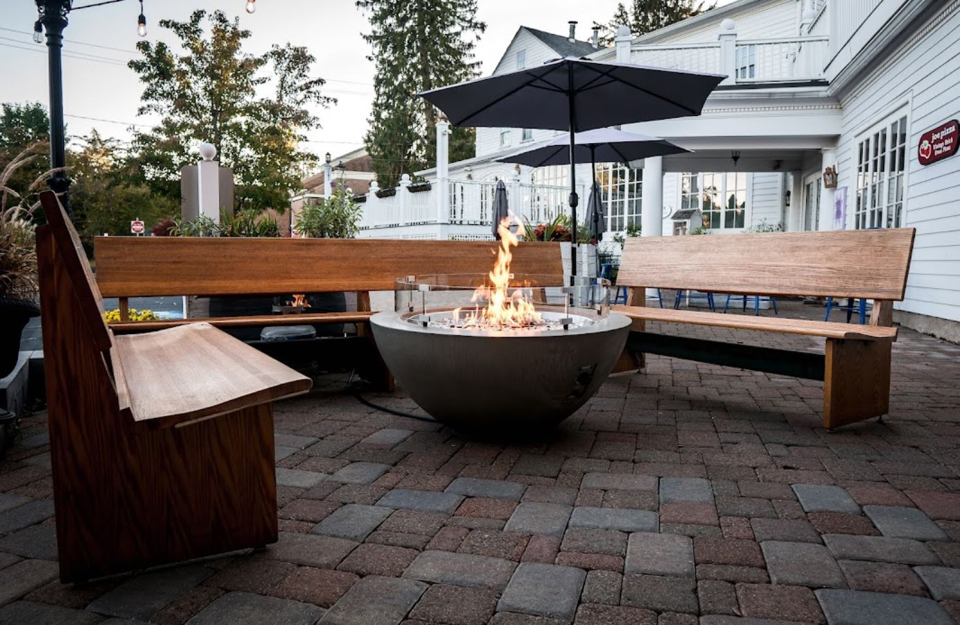 Outside, seating by a fire pit