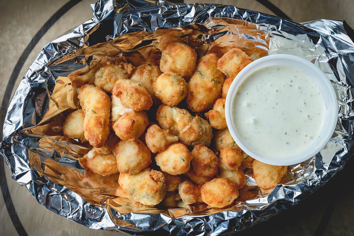 Cheese curds and sauce dip, top view