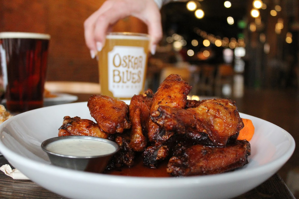 Buffalo wings, served with a sauce dip