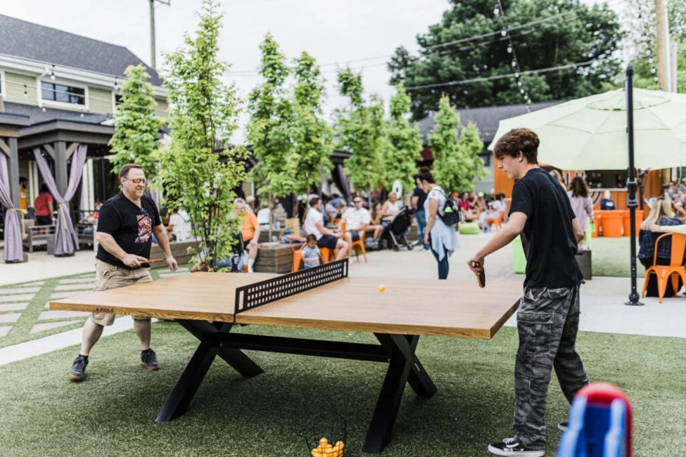 Men playing ping pong