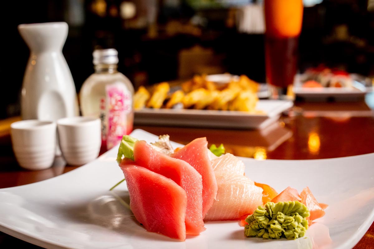 Nigiri and sashimi combo on the plate, angle view
