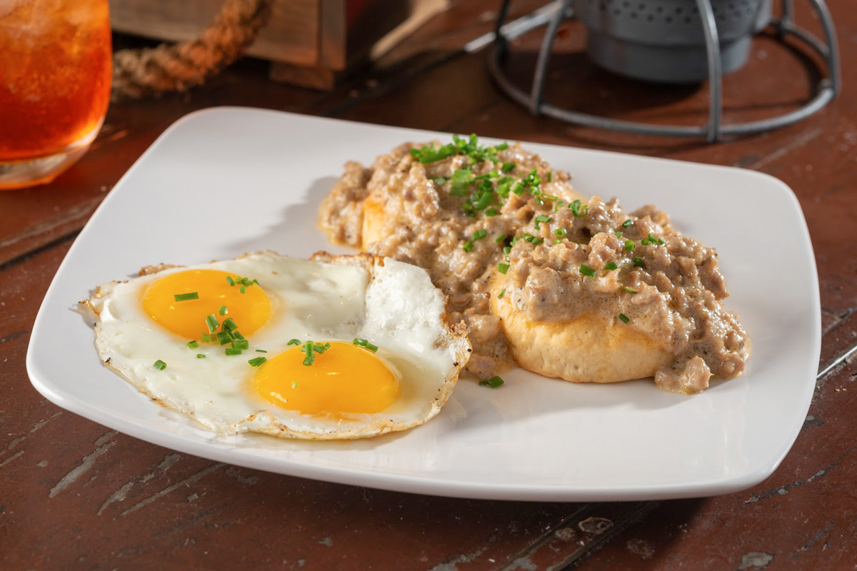 Biscuit gravy with two fried eggs