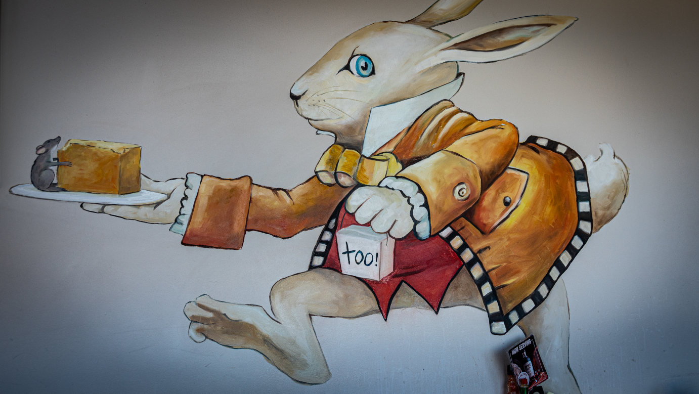 Mural of rabbit serving cheese