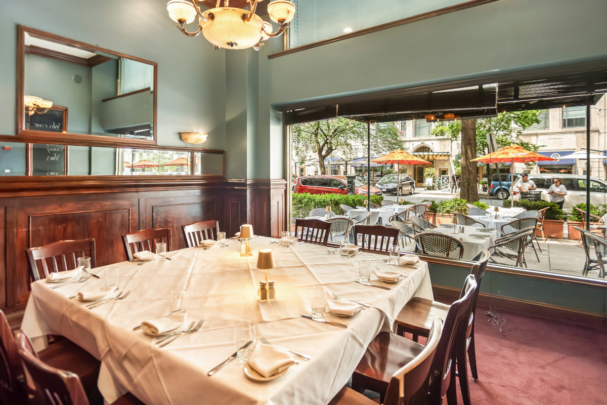 Interior, large group dining table, set for guests