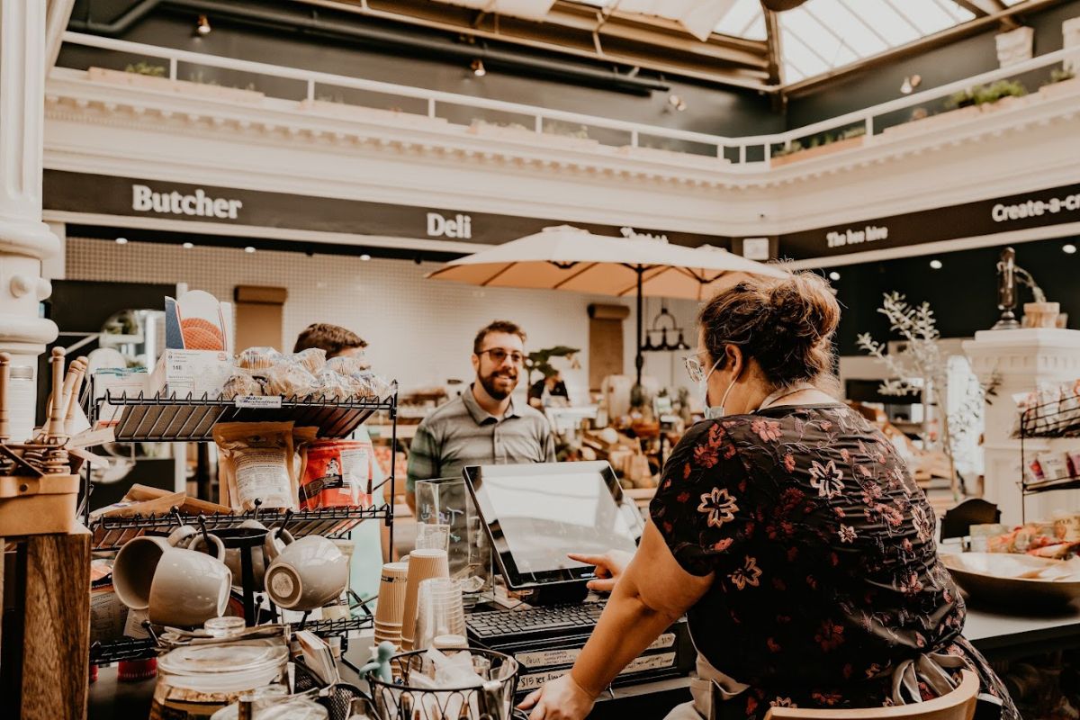 Satisfied customer at the cash register