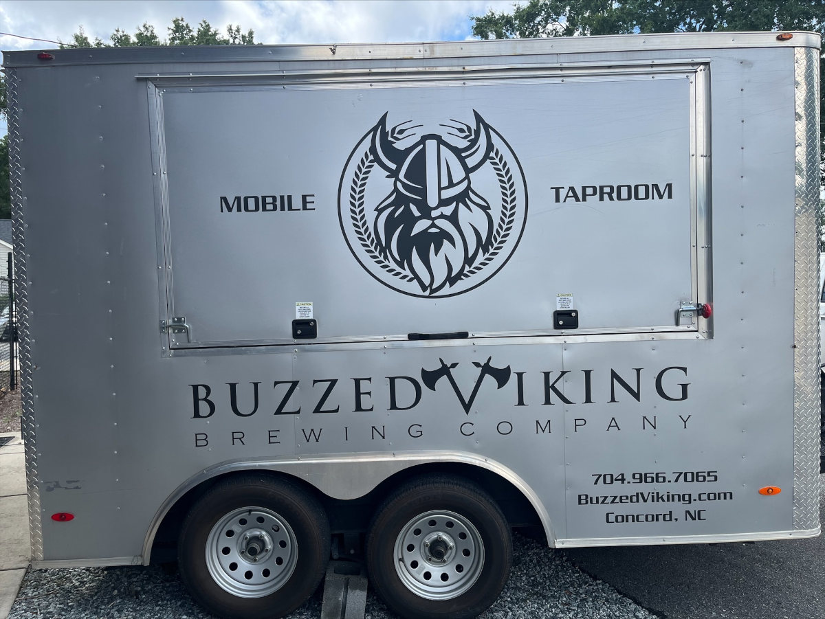 Mobile taproom cart parked on a street