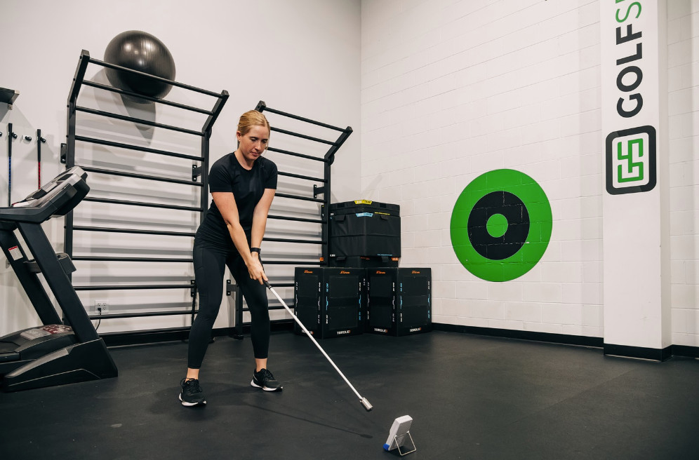 One person exercising in a gym